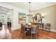 Elegant dining room with hardwood floors, a round table, and stylish decor at 4 Candler Grove Dr, Decatur, GA 30030