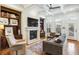 Comfortable living room features a fireplace, custom built-ins, and coffered ceilings at 4 Candler Grove Dr, Decatur, GA 30030