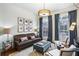 Comfortable living room featuring a sofa, armchairs, and ample natural light at 4 Candler Grove Dr, Decatur, GA 30030