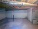Unfinished basement with exposed ductwork and painted support beams at 74 Sandy Path, Rockmart, GA 30153