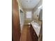 Traditional bathroom with a single vanity and shower-tub combination at 74 Sandy Path, Rockmart, GA 30153