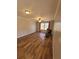 Comfortable bedroom with hard wood floors, ceiling fan, natural light, and neutral paint at 74 Sandy Path, Rockmart, GA 30153