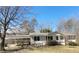 Charming single story home featuring a covered carport and a cozy front porch at 74 Sandy Path, Rockmart, GA 30153