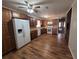 A well-lit kitchen featuring wooden cabinets and modern appliances at 74 Sandy Path, Rockmart, GA 30153