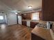 A functional kitchen space with gas range and wood cabinets at 74 Sandy Path, Rockmart, GA 30153