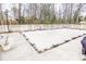 An above-ground pool area has been prepped and the pool is securely covered for the off-season at 1376 Highway 138 E, Stockbridge, GA 30281