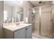 Clean bathroom featuring a glass-enclosed shower, modern fixtures, and neutral tones at 791 Se Wylie Street Se St # 912, Atlanta, GA 30316