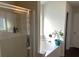 Bright bathroom featuring a separate shower and soaking tub, creating a relaxing spa-like experience at 801 Rutledge Ct, Woodstock, GA 30188
