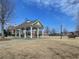 A central gazebo with picnic tables in a park-like setting with playground in the background at 801 Rutledge Ct, Woodstock, GA 30188