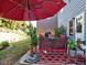 Relaxing patio area with comfortable seating and a colorful rug at 801 Rutledge Ct, Woodstock, GA 30188