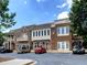 Attractive mixed-use building with ample parking, retail, and residential units at 801 Rutledge Ct, Woodstock, GA 30188