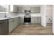 Stylish kitchen with stainless steel appliances, modern countertops, and ample cabinet space for storage at 2011 Farm Hill Ct, Stockbridge, GA 30281