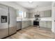 Stylish kitchen with stainless steel appliances, modern countertops, and ample cabinet space for storage at 2011 Farm Hill Ct, Stockbridge, GA 30281