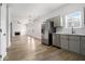 Open-concept kitchen that flows into a spacious living area featuring a cozy fireplace, great for entertaining at 2011 Farm Hill Ct, Stockbridge, GA 30281