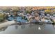 Aerial view of a neighborhood featuring tennis courts, pond, and a community pool at 6305 Deerwoods Trl, Alpharetta, GA 30005