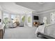 Main bedroom features large windows and a sitting area at 6305 Deerwoods Trl, Alpharetta, GA 30005