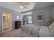 Bedroom featuring a ceiling fan, neutral paint, and sitting nook with plenty of natural light at 6305 Deerwoods Trl, Alpharetta, GA 30005