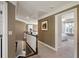 Hallway features a picture and access to bedrooms at 6305 Deerwoods Trl, Alpharetta, GA 30005