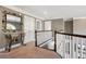 Hallway features a decorative mirror, and a staircase at 6305 Deerwoods Trl, Alpharetta, GA 30005