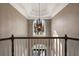 Foyer showcasing vaulted ceiling, chandelier, and a view of the entrance at 6305 Deerwoods Trl, Alpharetta, GA 30005