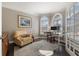 Bright office space with elegant moldings, arched windows, and a view to the outside at 6305 Deerwoods Trl, Alpharetta, GA 30005