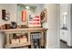 Custom bar area featuring rustic wooden countertop, beverage cooler, and unique decor at 164 Inwood Walk, Woodstock, GA 30188