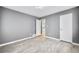 Bedroom showcasing a gray walls, white doors and trim and modern wood-look flooring at 1788 Rosewood Rd, Decatur, GA 30032