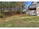 Large backyard with mature trees at the property line for added privacy at 2557 Tolliver Dr, Ellenwood, GA 30294