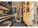 Bedroom featuring bunk beds, a black and white striped rug, and a custom-built closet system at 45 Ivan Allen Jr Nw Blvd # 1706, Atlanta, GA 30308