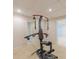 Basement featuring exercise equipment, neutral carpet, and adjacent rooms at 5594 Mountain View Pass, Stone Mountain, GA 30087