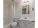 Bathroom with shower and tub, neutral walls, and white sink at 5594 Mountain View Pass, Stone Mountain, GA 30087