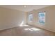 Bedroom with two windows letting in natural light at 5594 Mountain View Pass, Stone Mountain, GA 30087