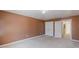 Bedroom features plush carpet, paint in neutral colors, and double door closets at 5594 Mountain View Pass, Stone Mountain, GA 30087