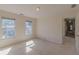 Bedroom with two windows letting in natural light at 5594 Mountain View Pass, Stone Mountain, GA 30087