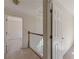 Hallway with staircase and access to bedrooms at 5594 Mountain View Pass, Stone Mountain, GA 30087