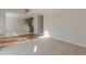 Spacious living area featuring hardwood floors, staircase, and chandelier at 5594 Mountain View Pass, Stone Mountain, GA 30087