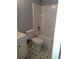 Standard bathroom with toilet, sink, and shower at 10221 Deep Creek Pl, Union City, GA 30291