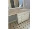 Bathroom vanity with white cabinets and granite countertop at 10221 Deep Creek Pl, Union City, GA 30291