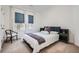 Well-lit bedroom with a bed, windows, stylish decor, and plush carpet, perfect for relaxation at 2987 Jefferson St, Atlanta, GA 30341