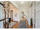 Elegant foyer with hardwood floors, arched doorways, decorative lighting, and an open view of the home at 2987 Jefferson St, Atlanta, GA 30341