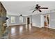 This living room has hardwood flooring, fireplace, and grey walls, creating a cozy atmosphere at 3430 Pate Rd, Snellville, GA 30078