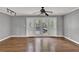 The living room features hardwood floors and a set of glass doors to the outdoor patio at 3430 Pate Rd, Snellville, GA 30078