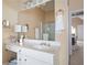 Bright bathroom featuring double vanity, and separate shower with glass door at 5952 Edenfield Nw Dr, Acworth, GA 30101