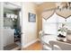 Bright dining area adjacent to laundry room with hardwood floors and lots of light at 5952 Edenfield Nw Dr, Acworth, GA 30101
