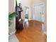 Inviting foyer with hardwood floors, high ceilings, and sidelights surrounding the front door at 5952 Edenfield Nw Dr, Acworth, GA 30101