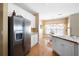 Kitchen boasts stainless steel appliances, white cabinets, and an adjacent breakfast nook at 5952 Edenfield Nw Dr, Acworth, GA 30101