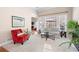 Cozy living room showcasing natural light, plush carpeting, and a comfortable seating arrangement at 5952 Edenfield Nw Dr, Acworth, GA 30101