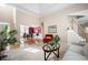 Spacious living area with high ceilings, hardwood floors, and an open layout to dining room at 5952 Edenfield Nw Dr, Acworth, GA 30101
