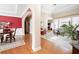 Open concept living area with hardwood floors, carpet, and a view into the dining room at 5952 Edenfield Nw Dr, Acworth, GA 30101