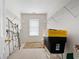 Bright walk-in closet with white shelving and a window. Ample space for organizing clothes and accessories at 5952 Edenfield Nw Dr, Acworth, GA 30101